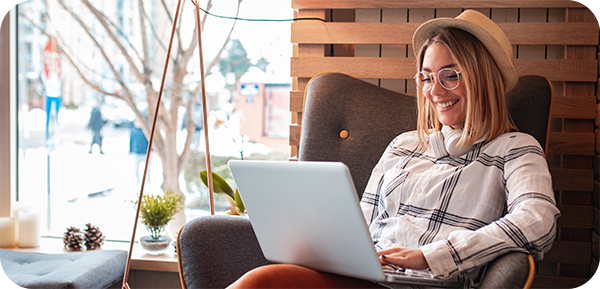 woman on laptop being approved for a low-rate HELOC